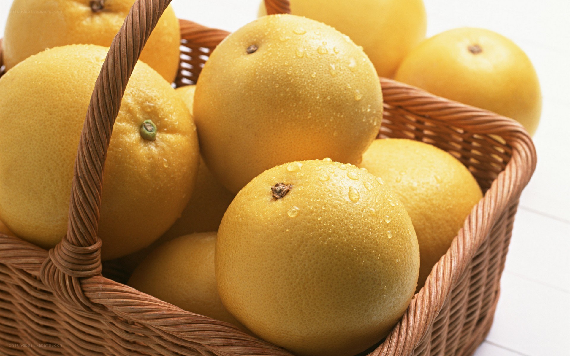 Fresh grapefruits in a basket
