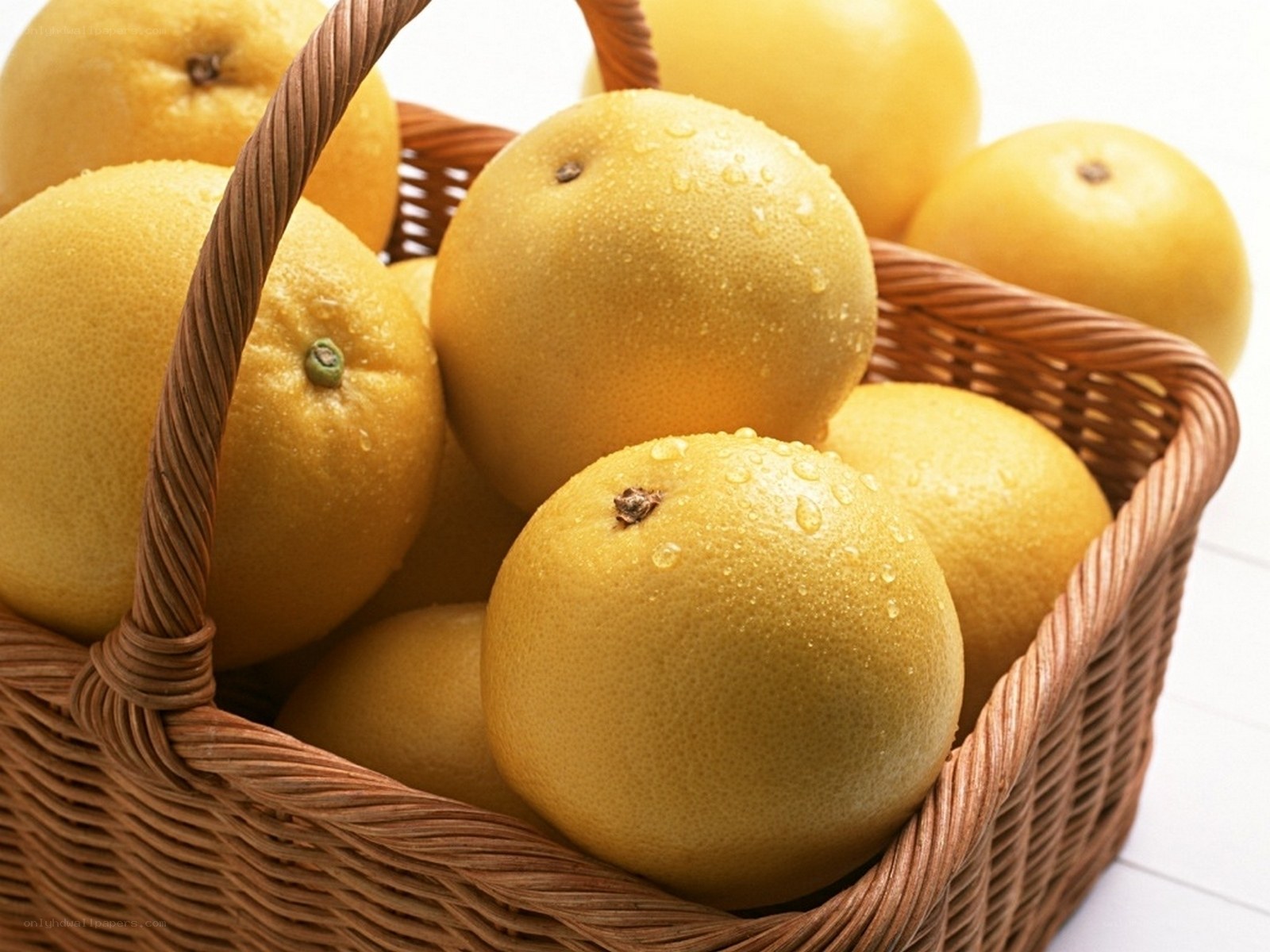 Fresh grapefruits in a basket