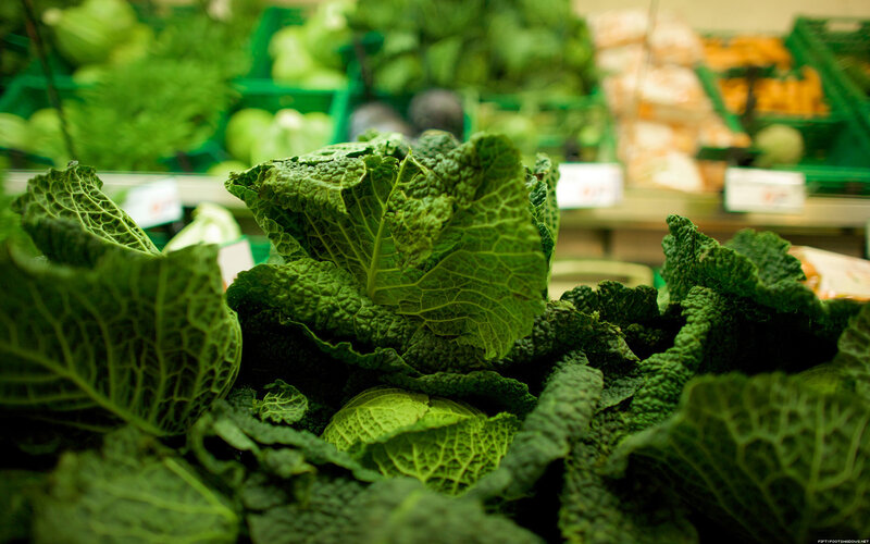 Fresh green cabbage in a market