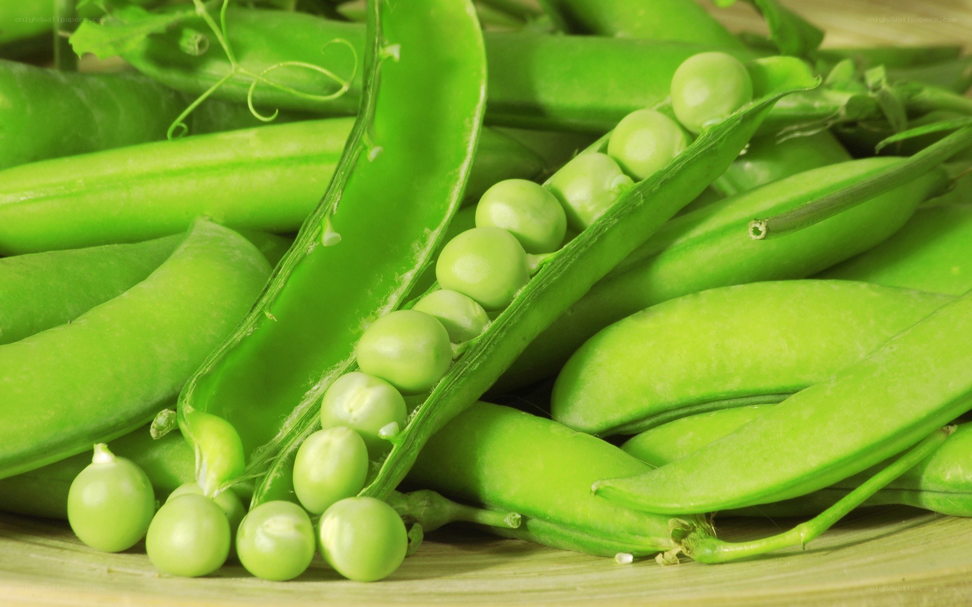 Fresh green peas in pods