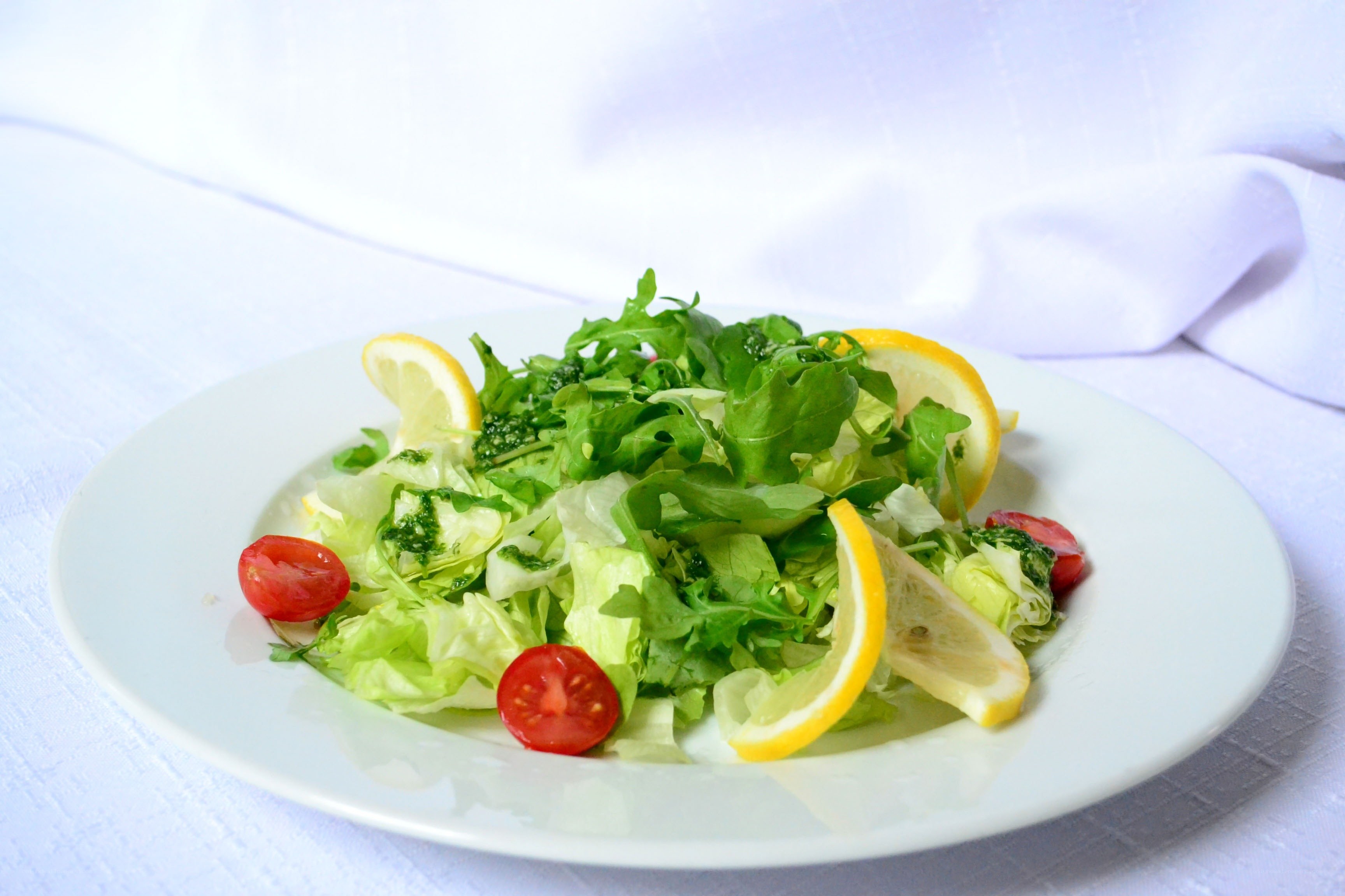 Fresh green salad with lemon