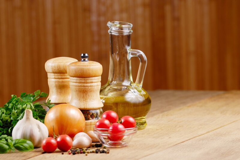 Fresh kitchen ingredients on wood
