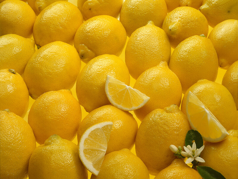 Fresh lemons and slices