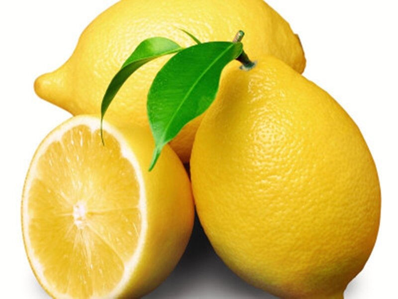 fresh lemons with leaves