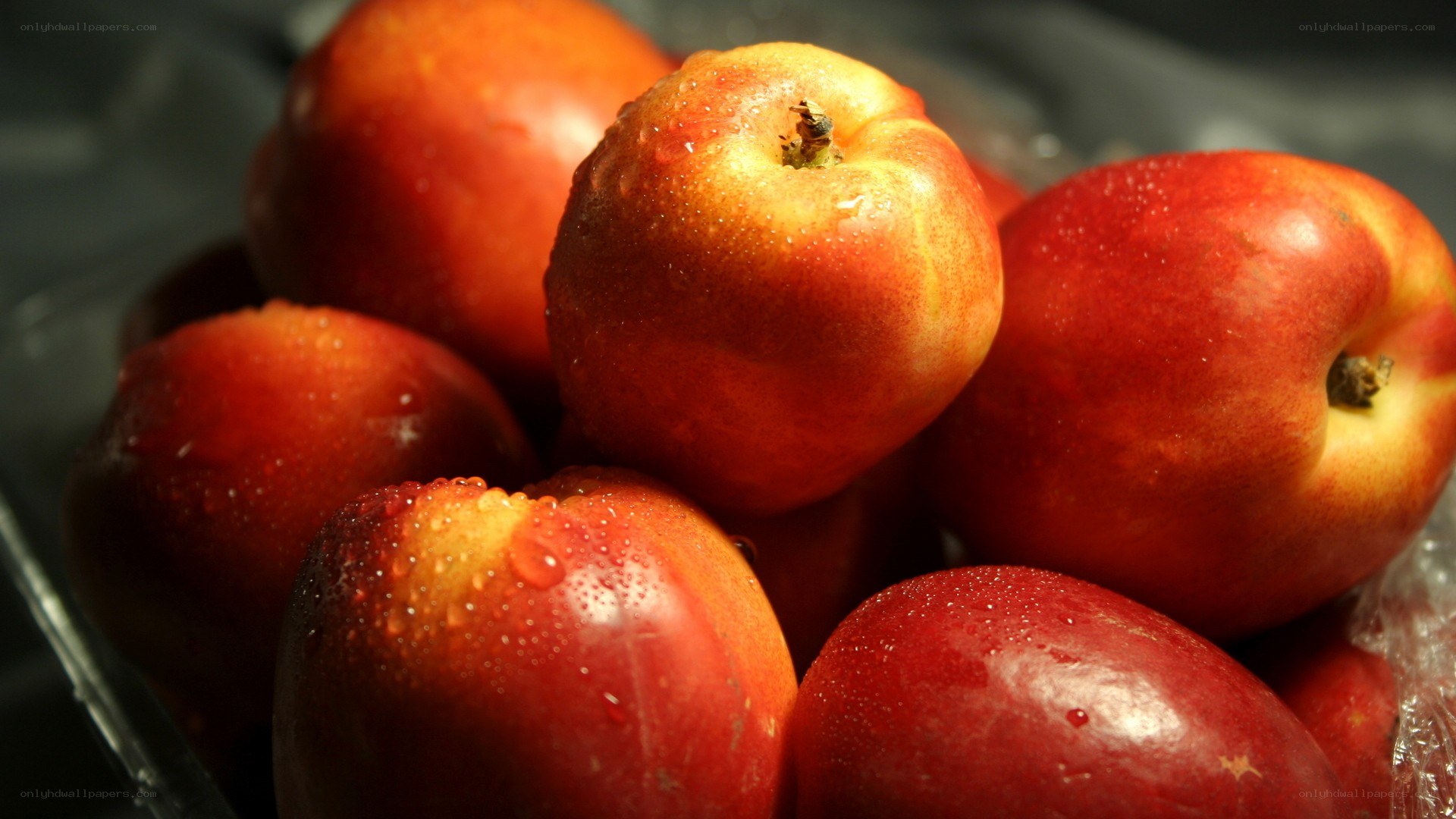 Fresh nectarines with water droplets