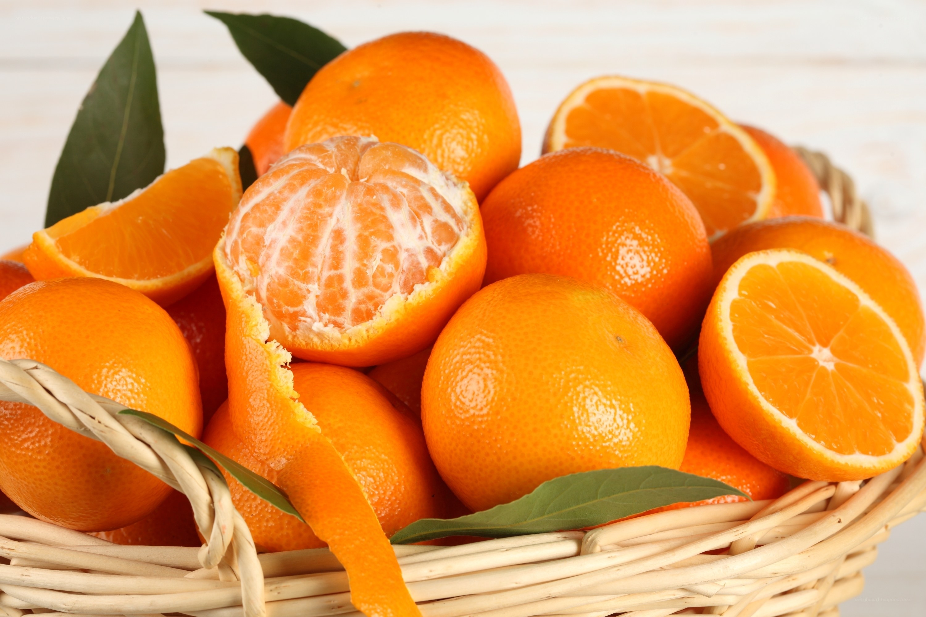Fresh oranges in a basket