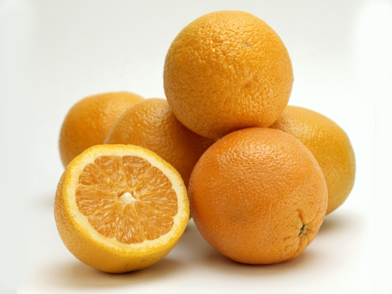 Fresh oranges on white background