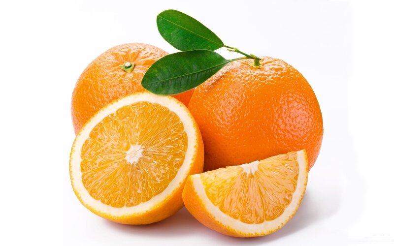 Fresh oranges with leaves