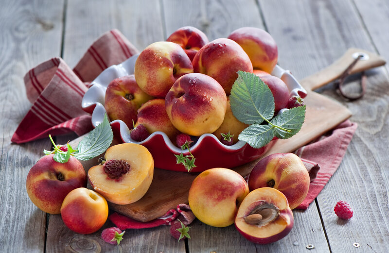 Fresh peaches and raspberries