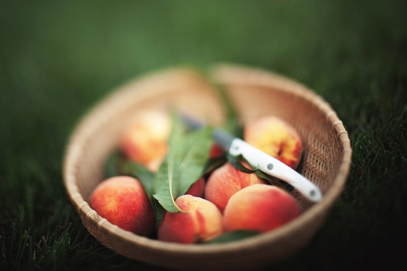 Fresh peaches in a basket