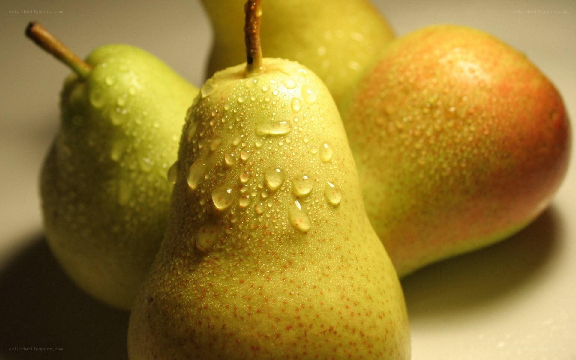 Fresh pears with water droplets