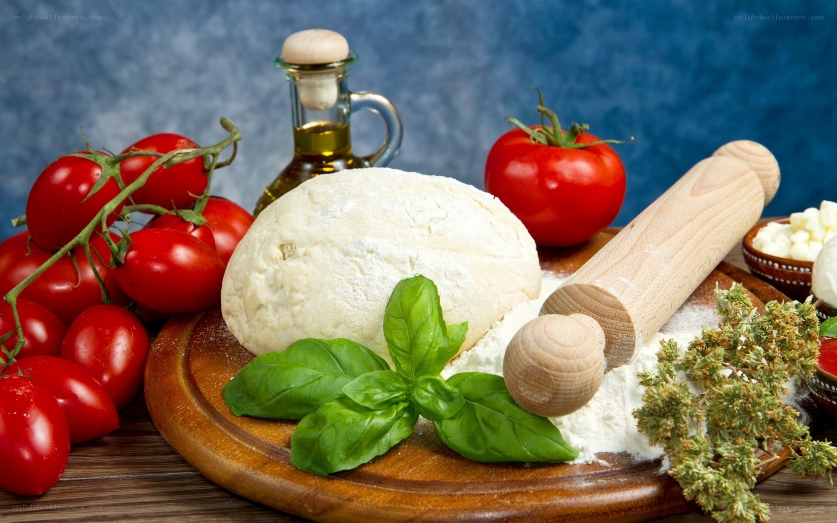 Fresh pizza ingredients on a board