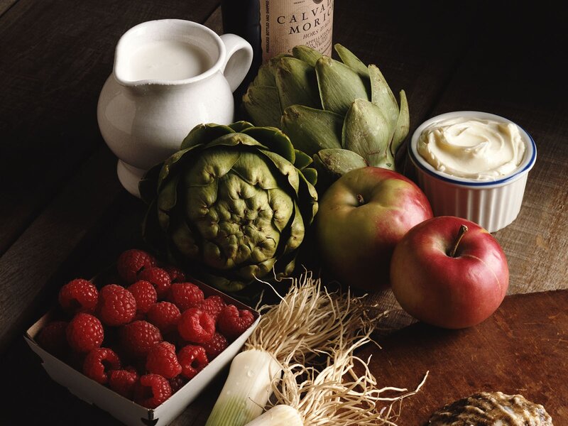 Fresh produce and dairy on wood