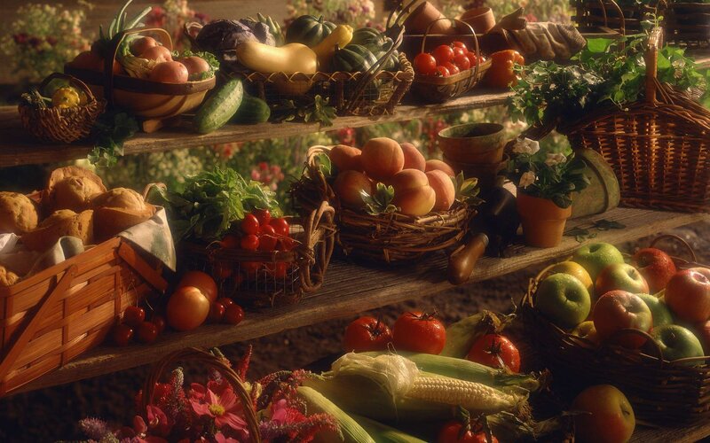 Fresh produce on wooden shelves