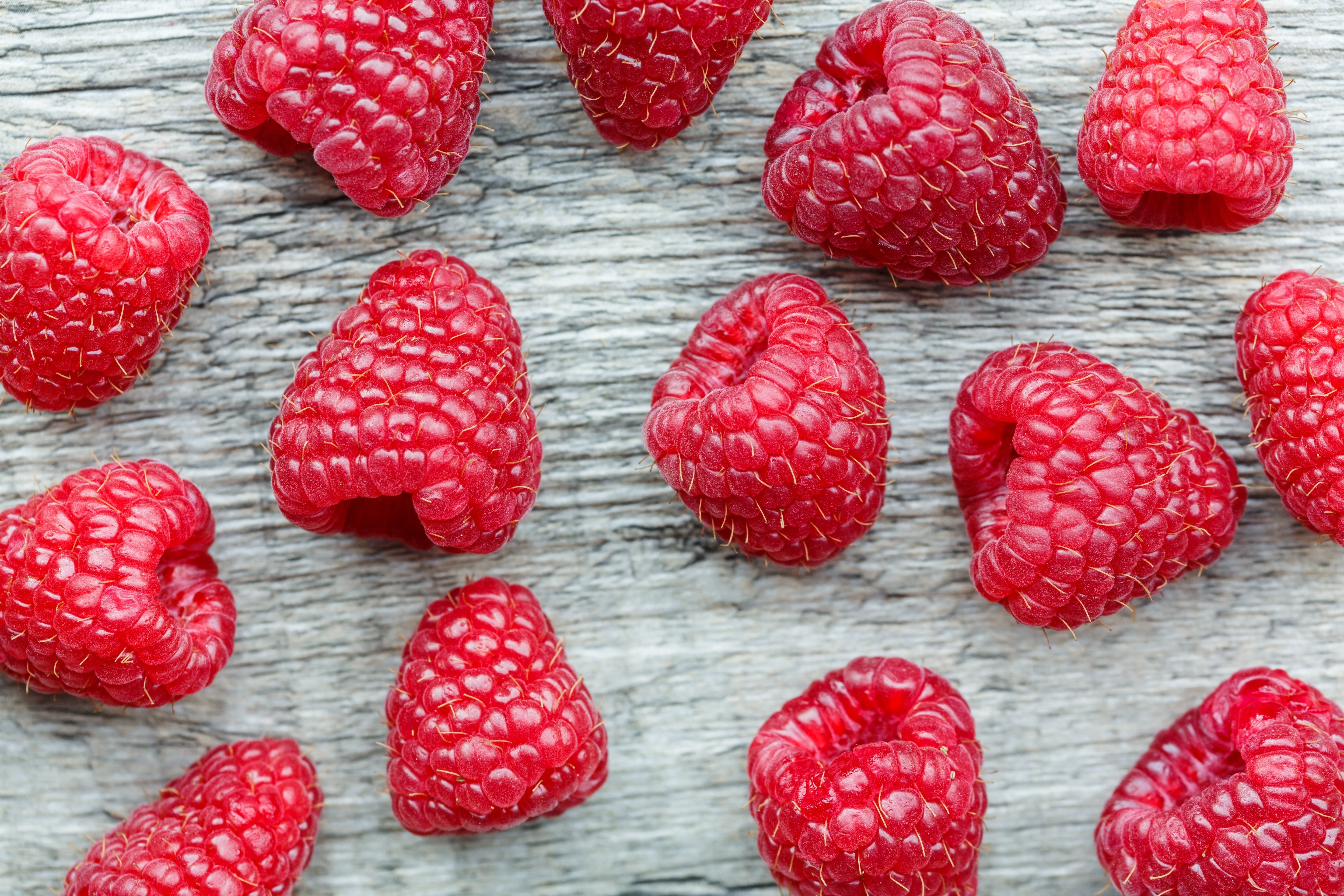 Fresh raspberries on wood