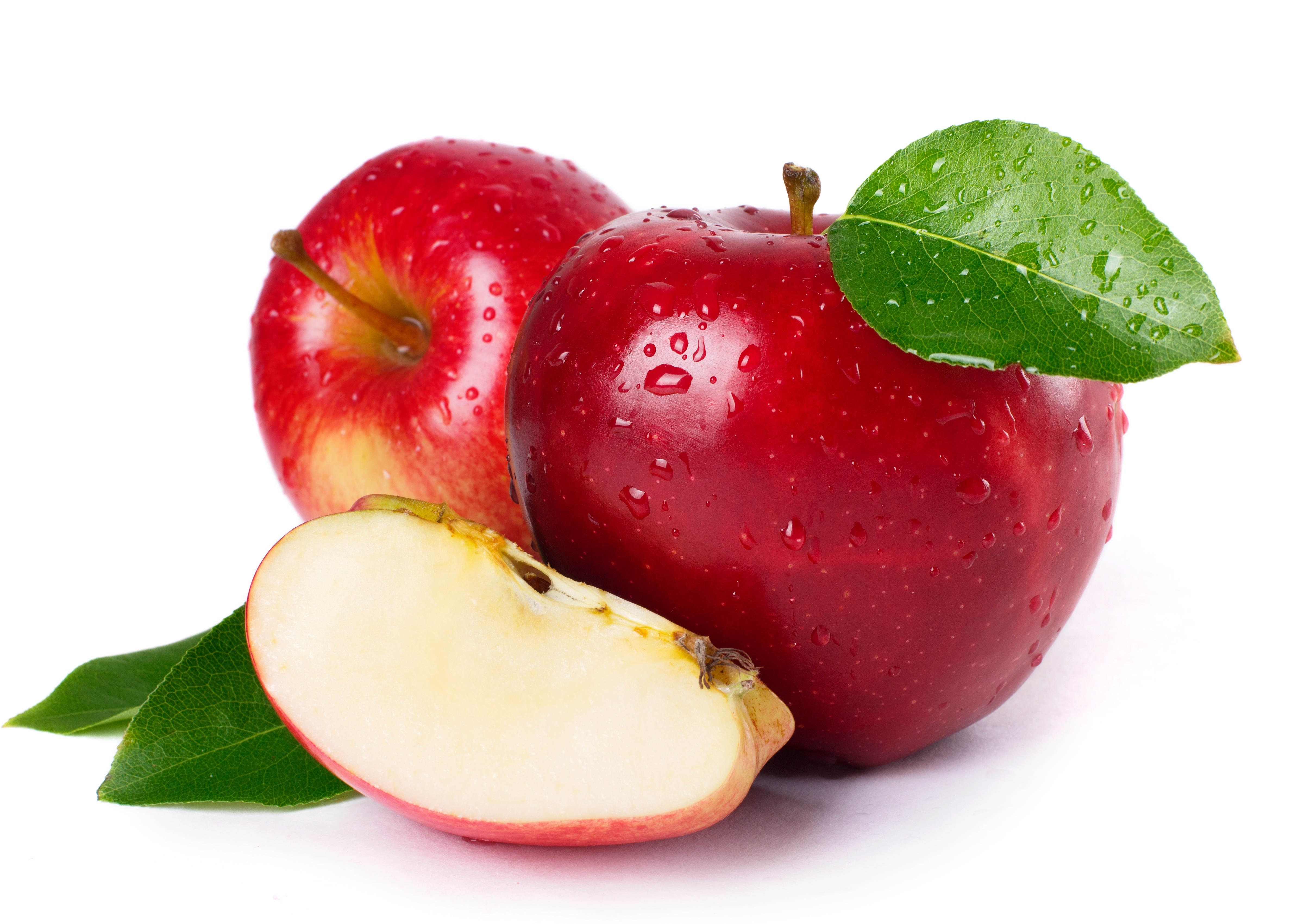 fresh red apples with leaves