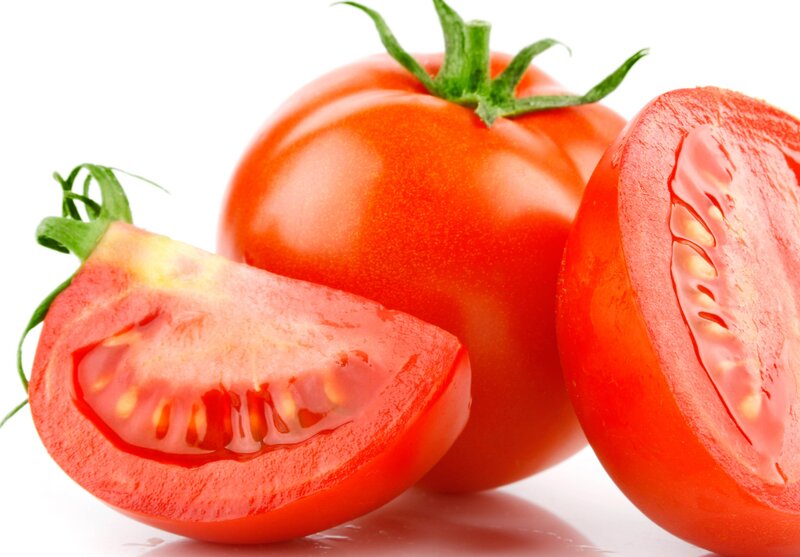 Fresh red tomatoes on white