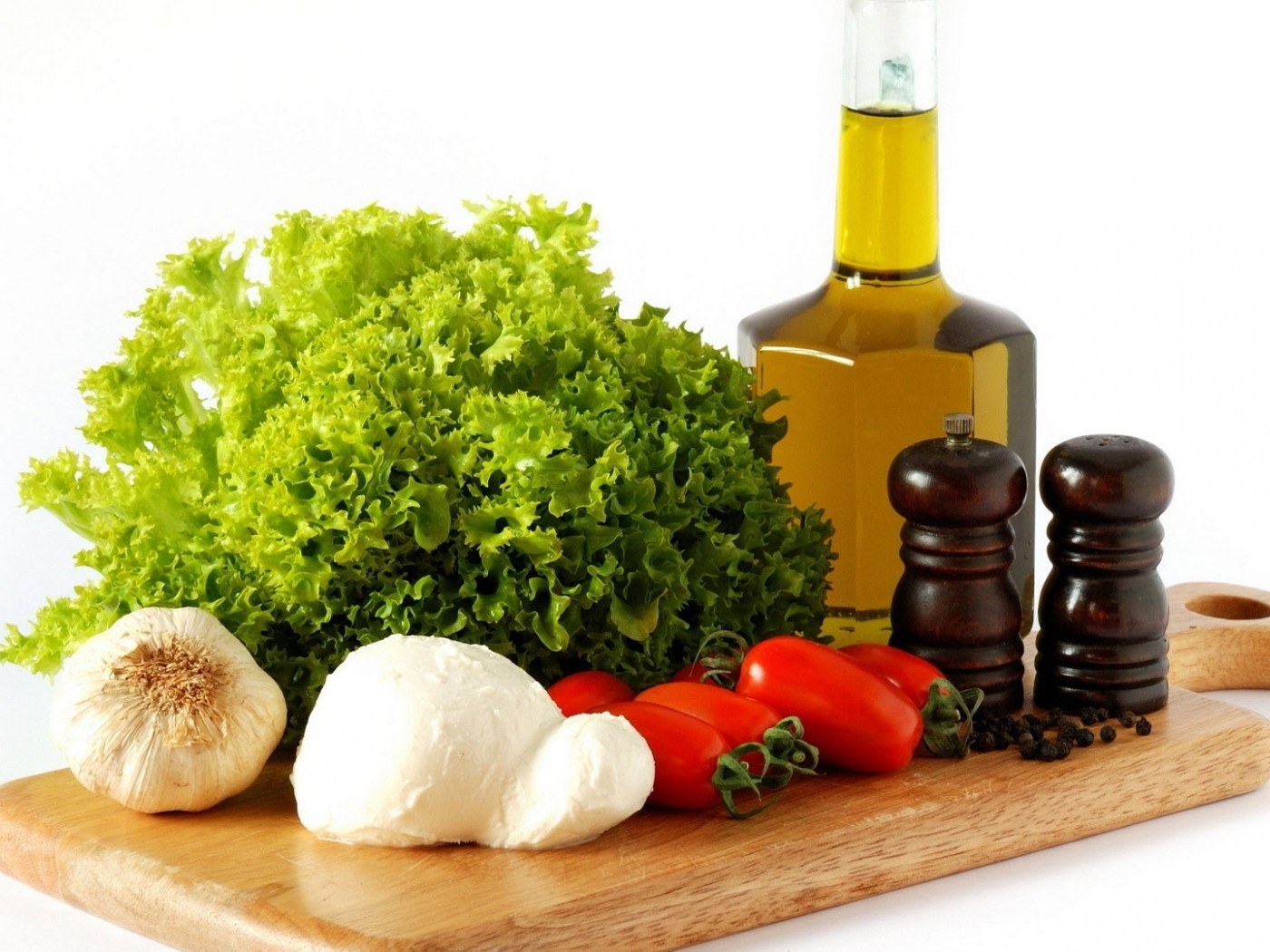 Fresh salad ingredients on a board
