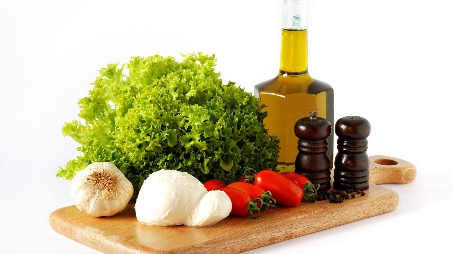 Fresh salad ingredients on cutting board