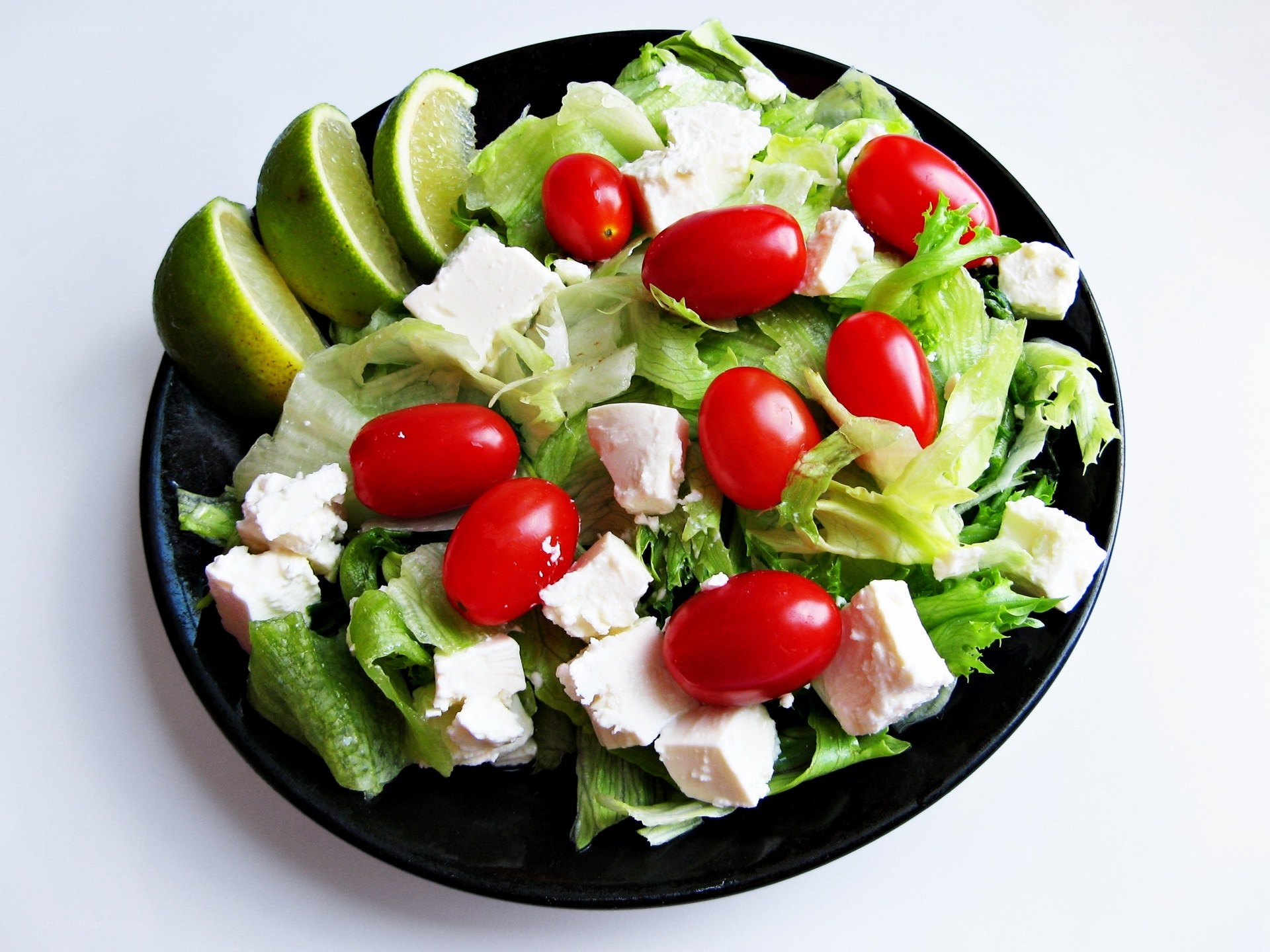 fresh salad with tomatoes and lime