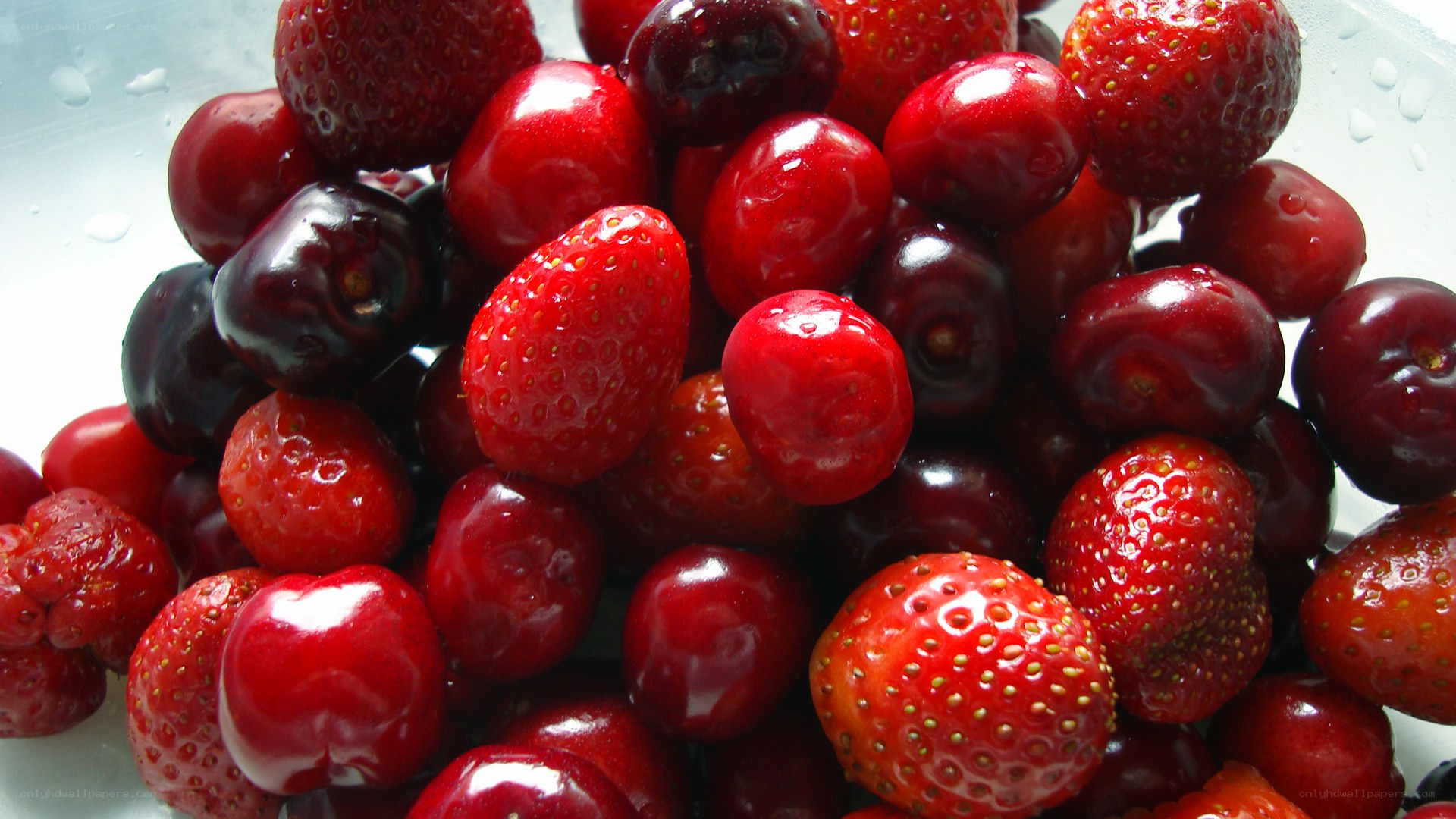 Fresh strawberries and cherries