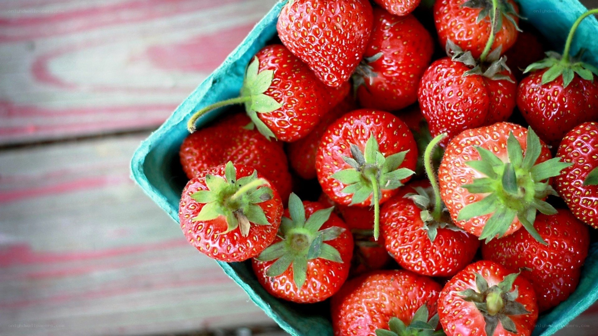 Fresh strawberries in a carton