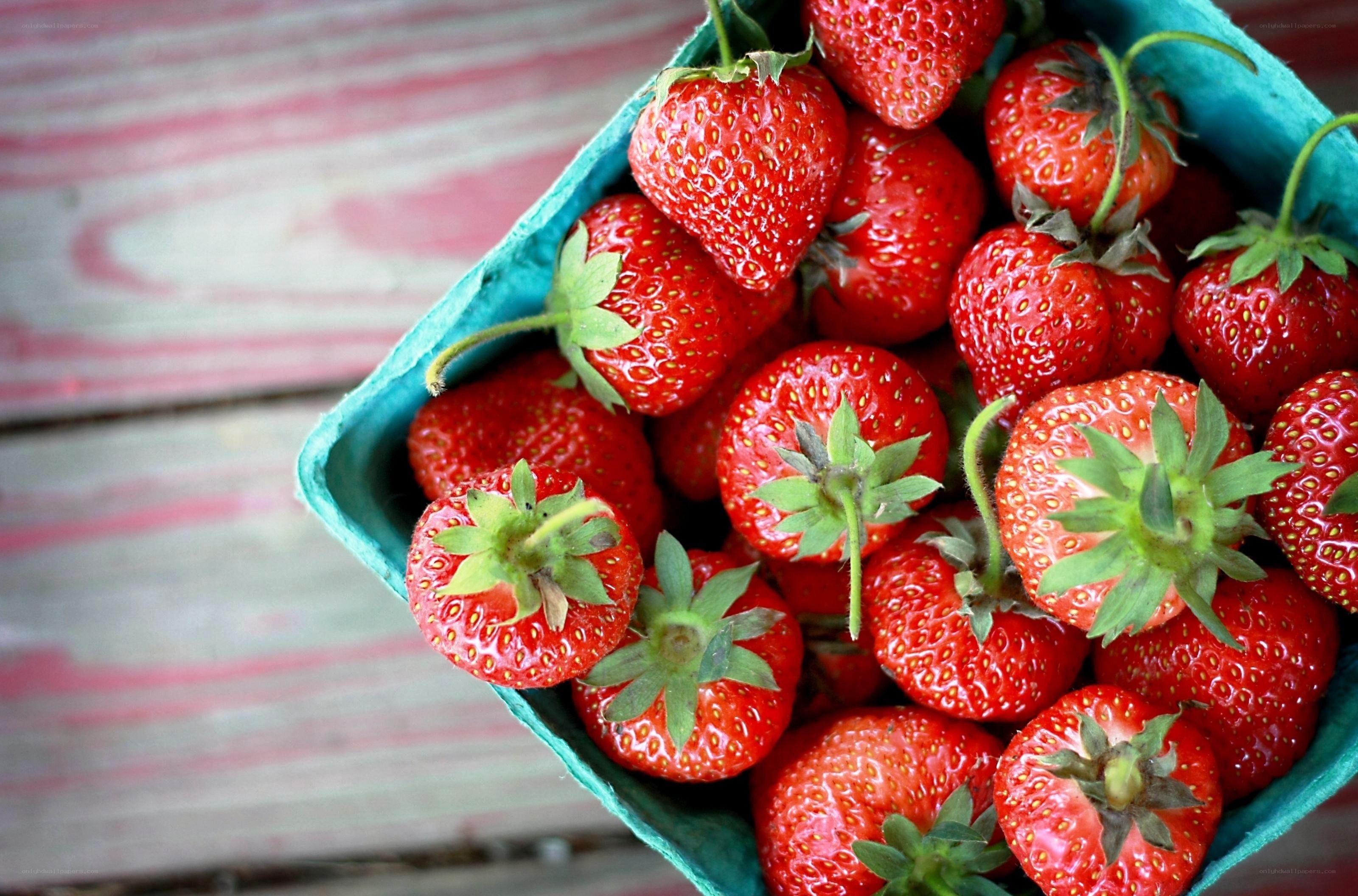 Fresh strawberries in a carton