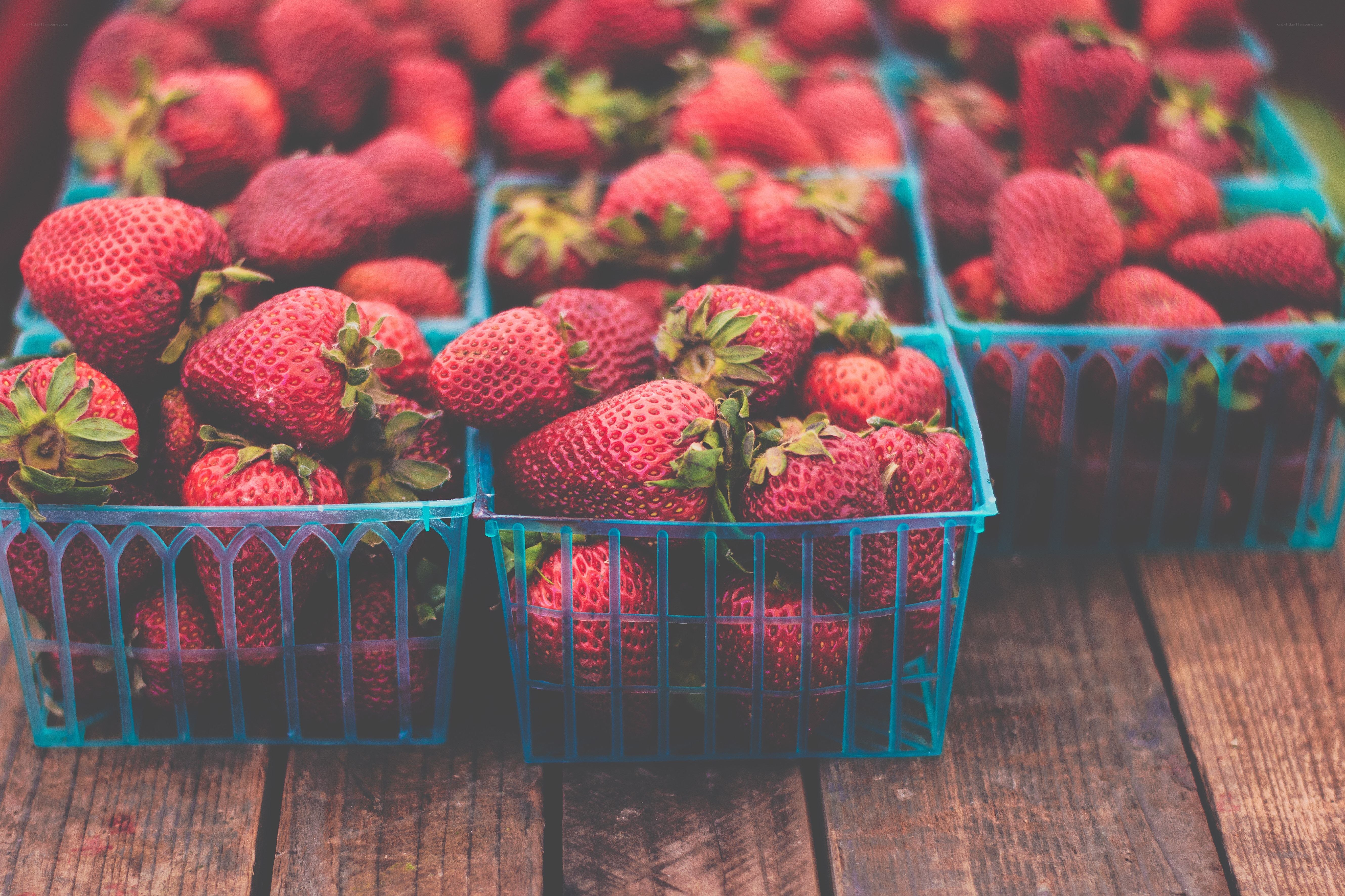 Fresh strawberries in baskets