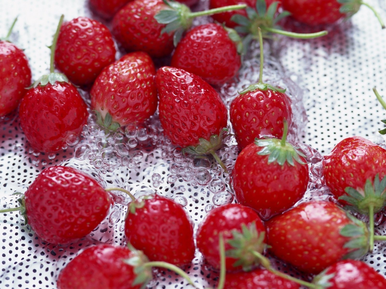 Fresh strawberries in water