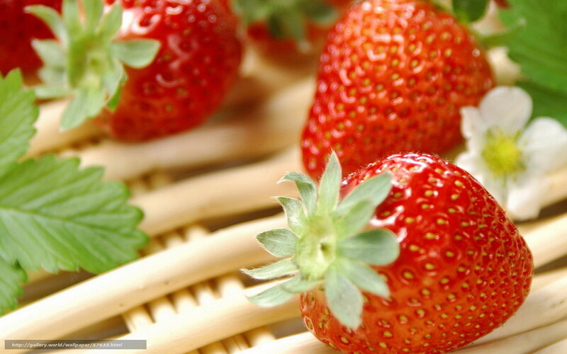 Fresh strawberries on bamboo