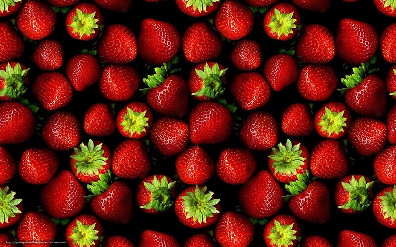 Fresh strawberries on black