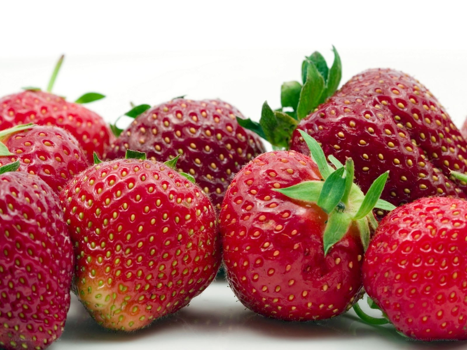 Fresh strawberries on white
