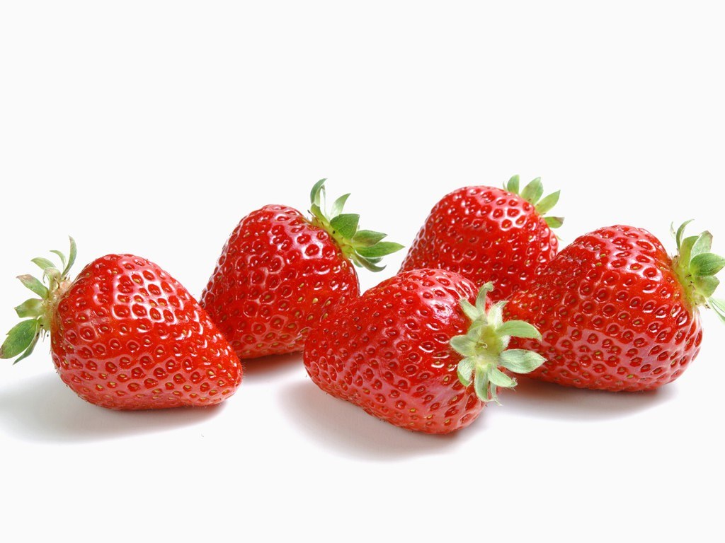 Fresh strawberries on white