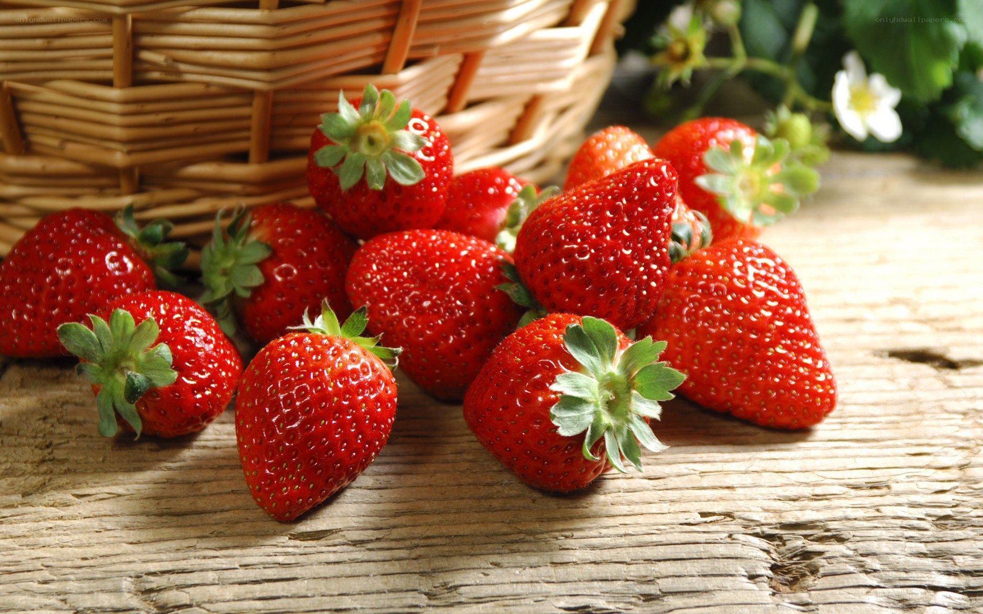 Fresh strawberries on wood