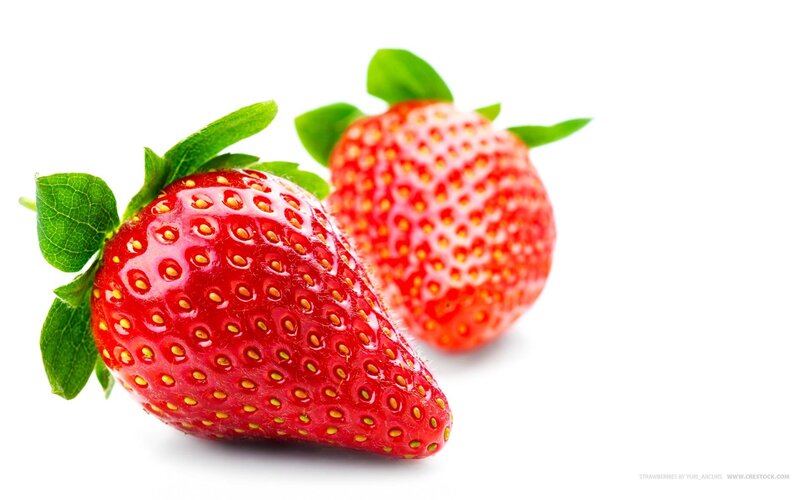 fresh strawberries with green leaves