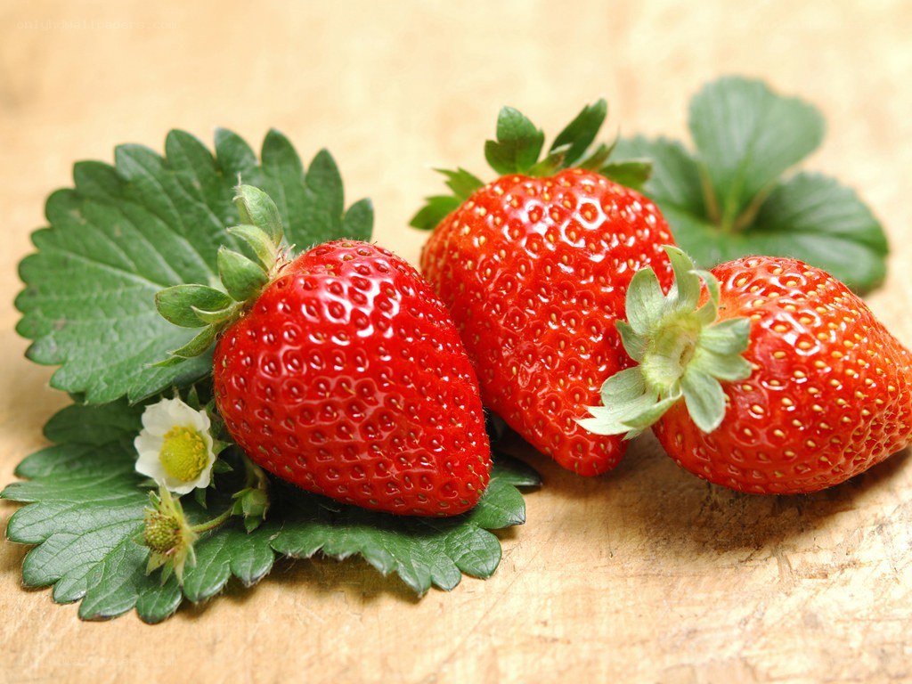 fresh strawberries with leaves