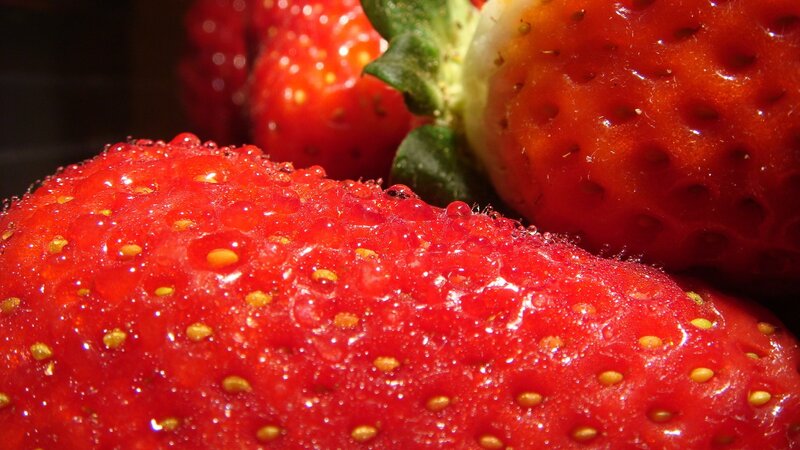 Fresh strawberries with water droplets