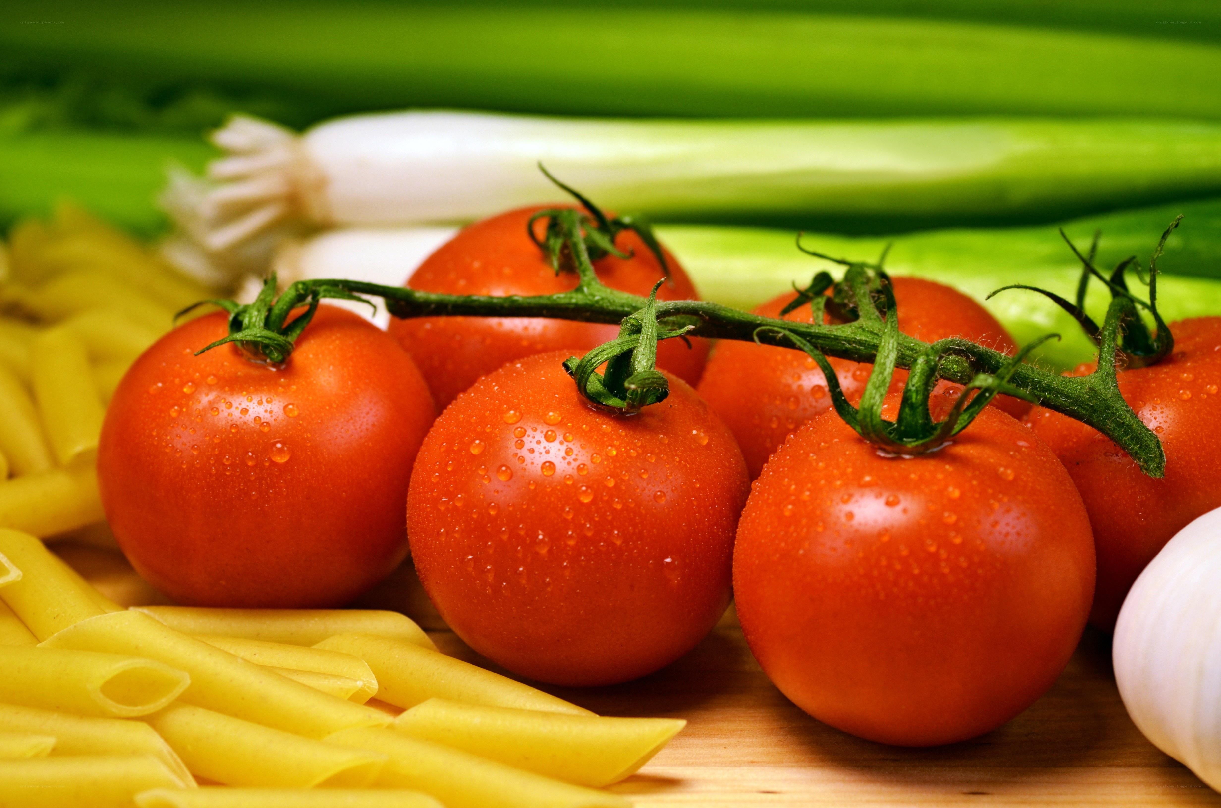 Fresh tomatoes and pasta ingredients