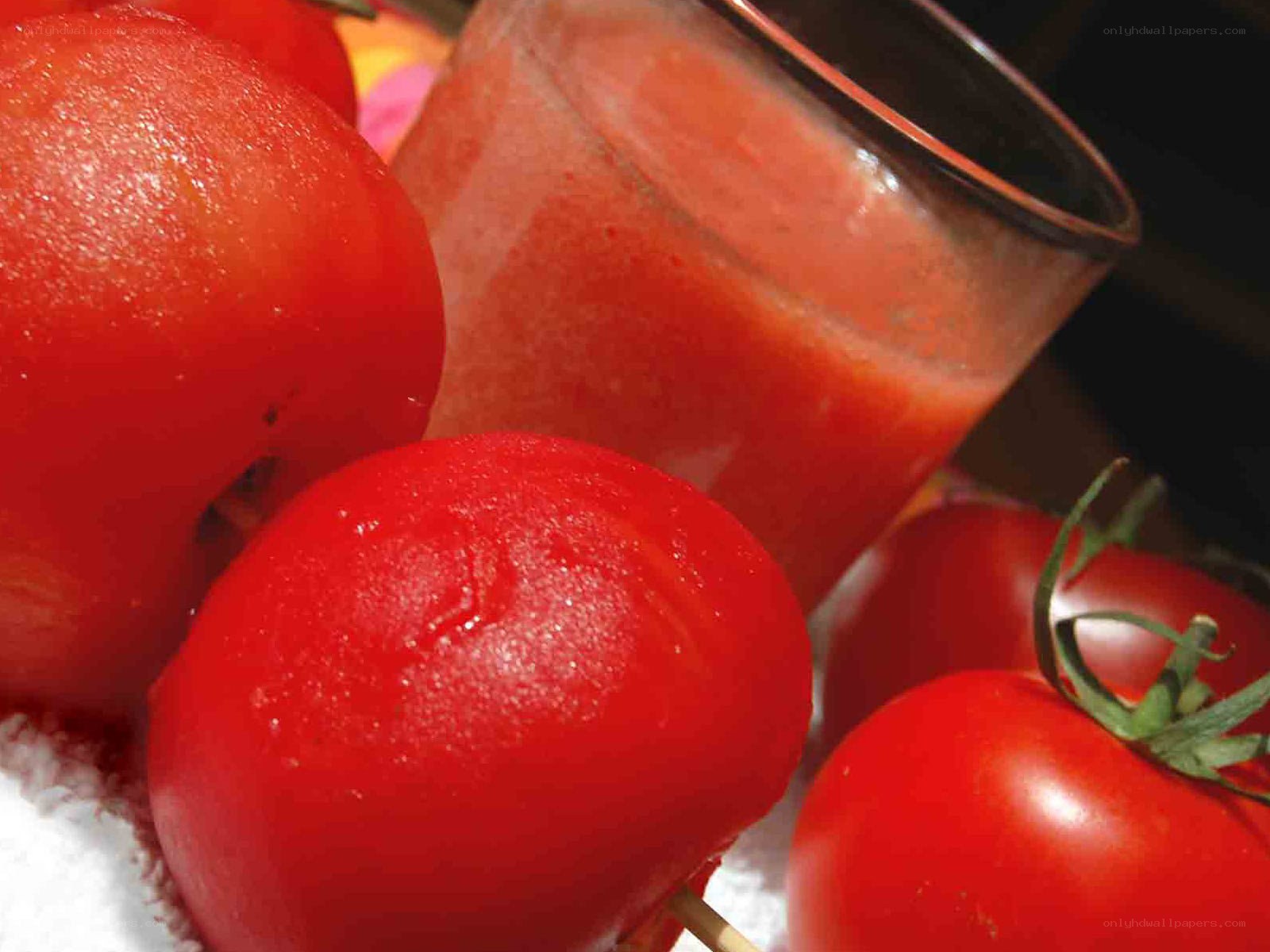 Fresh tomatoes and tomato juice