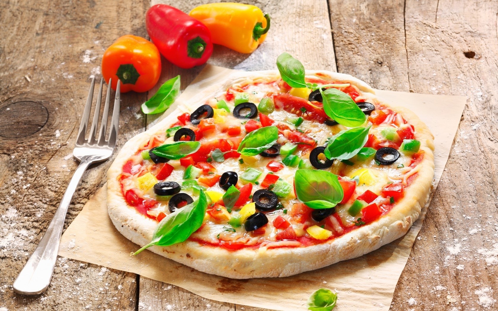 Fresh vegetable pizza on wood