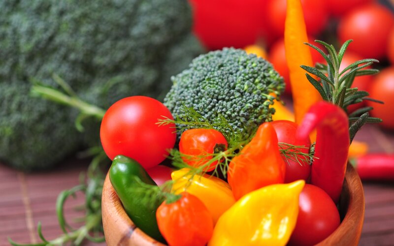 Fresh vegetables in a wooden bowl