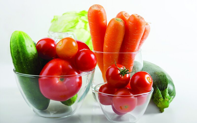 Fresh vegetables in glass bowls