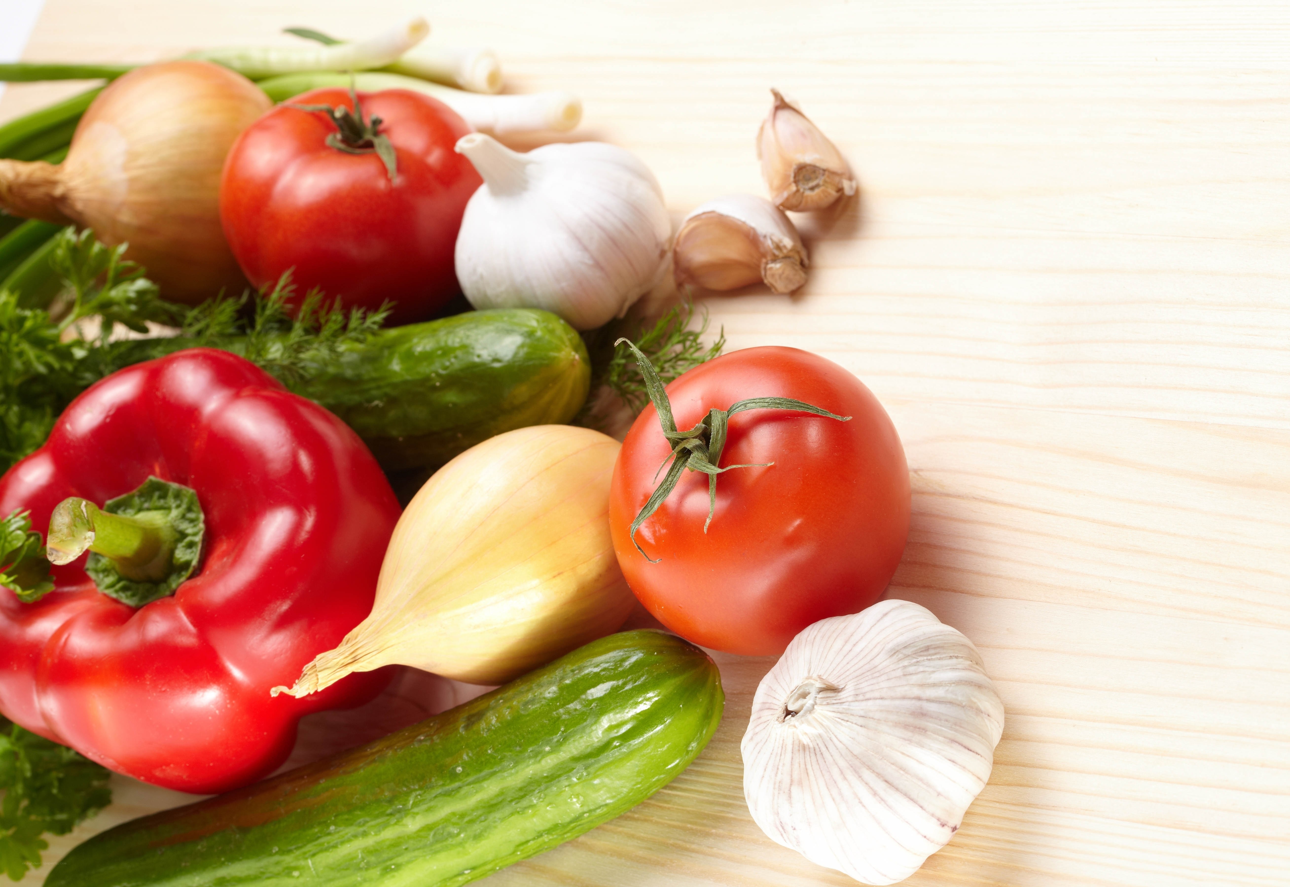 Fresh vegetables on wooden surface