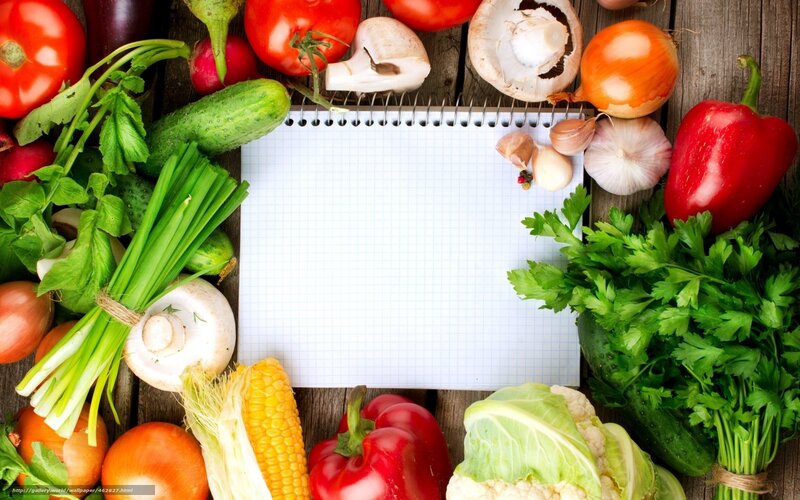 fresh vegetables with notebook