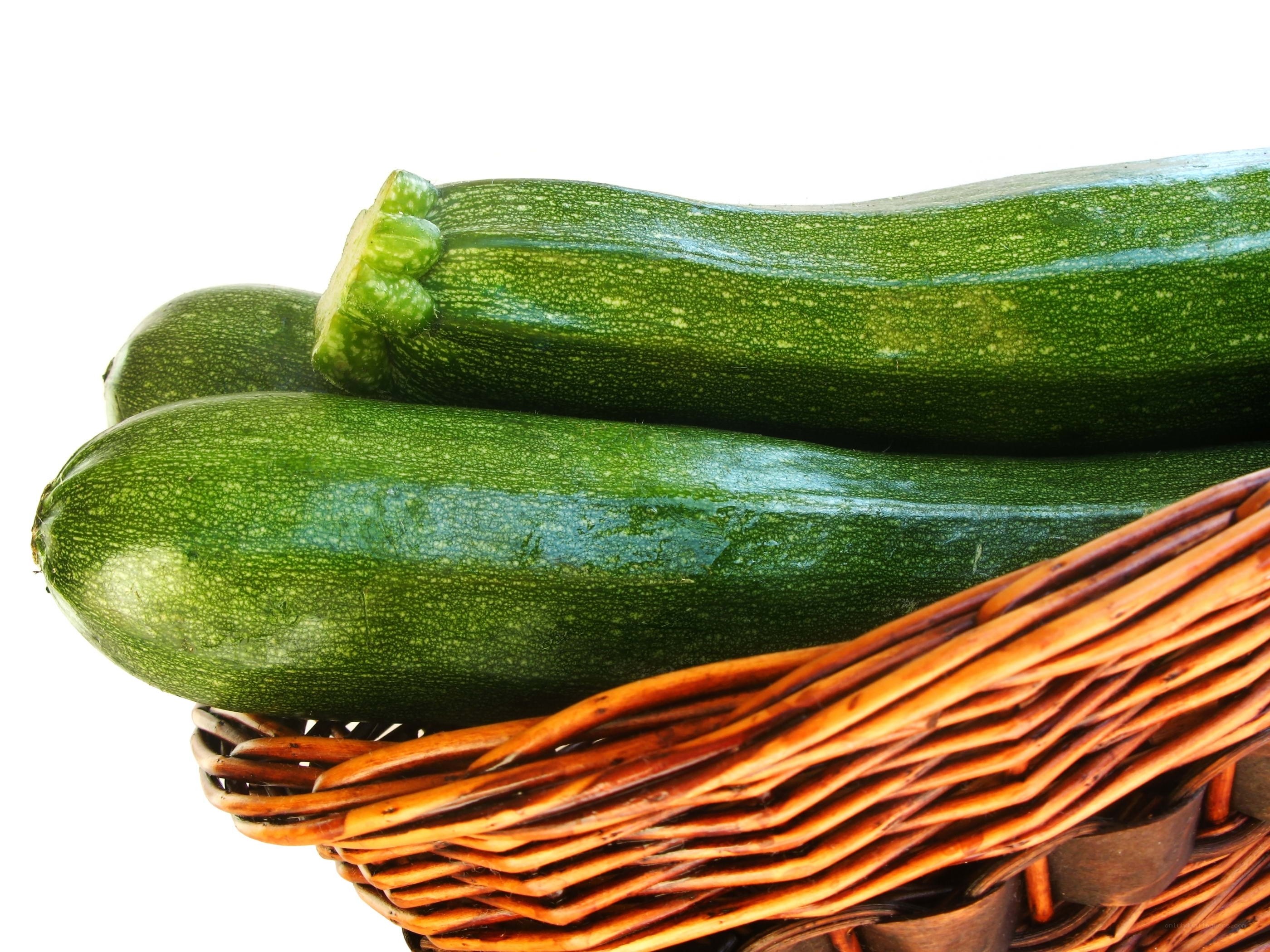 Fresh zucchinis in a basket