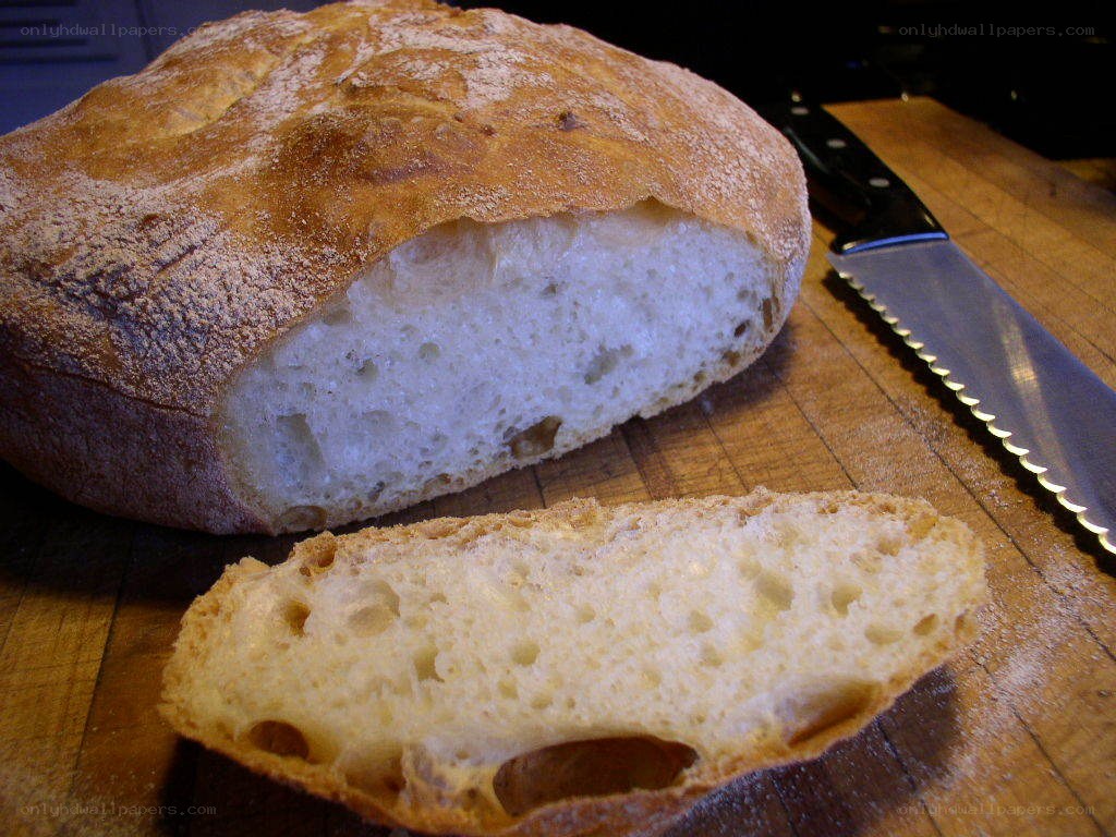 Freshly baked bread on a cutting board