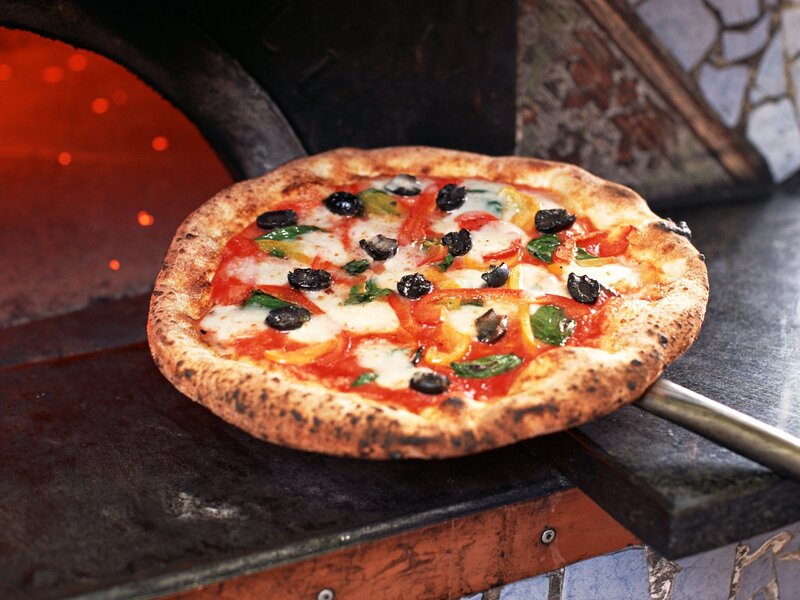 Freshly baked pizza from oven