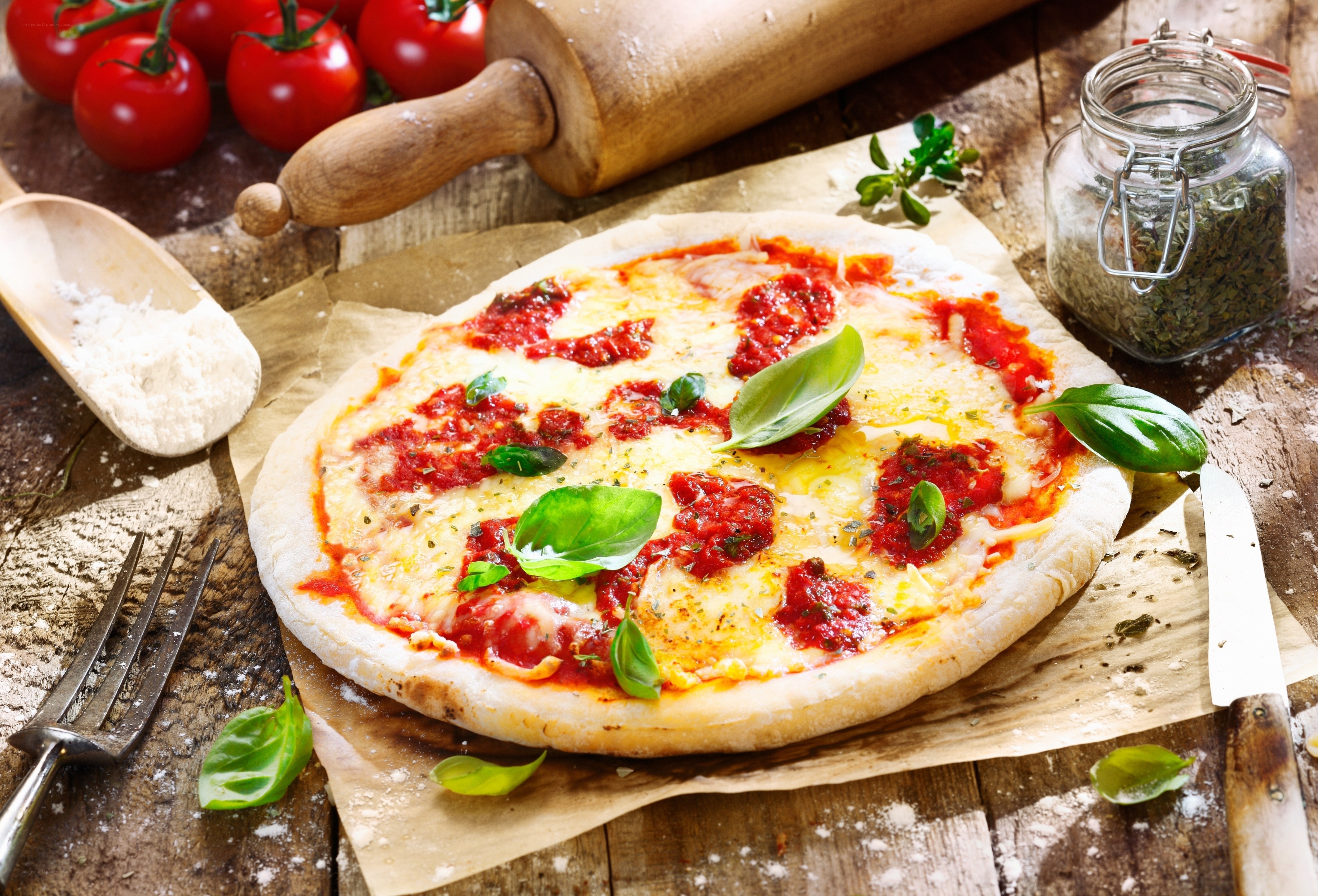 Freshly baked pizza with basil