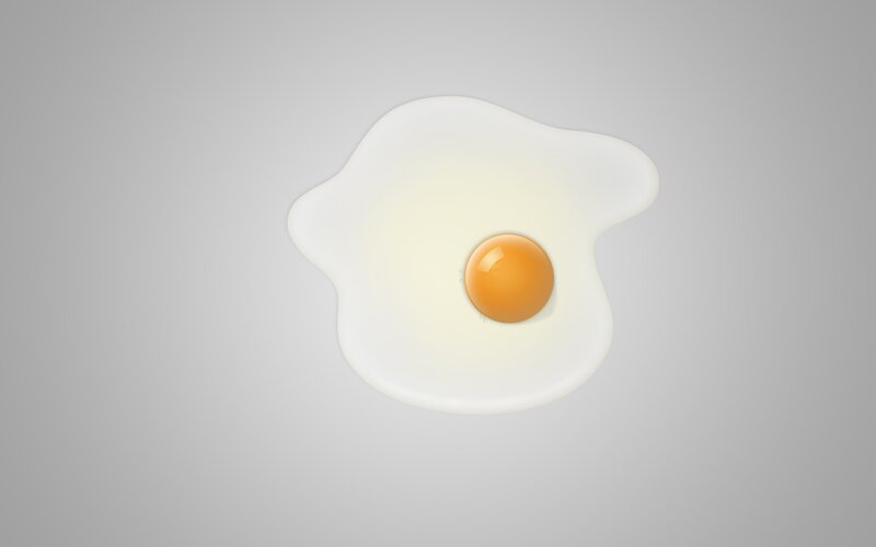 fried egg on gray background