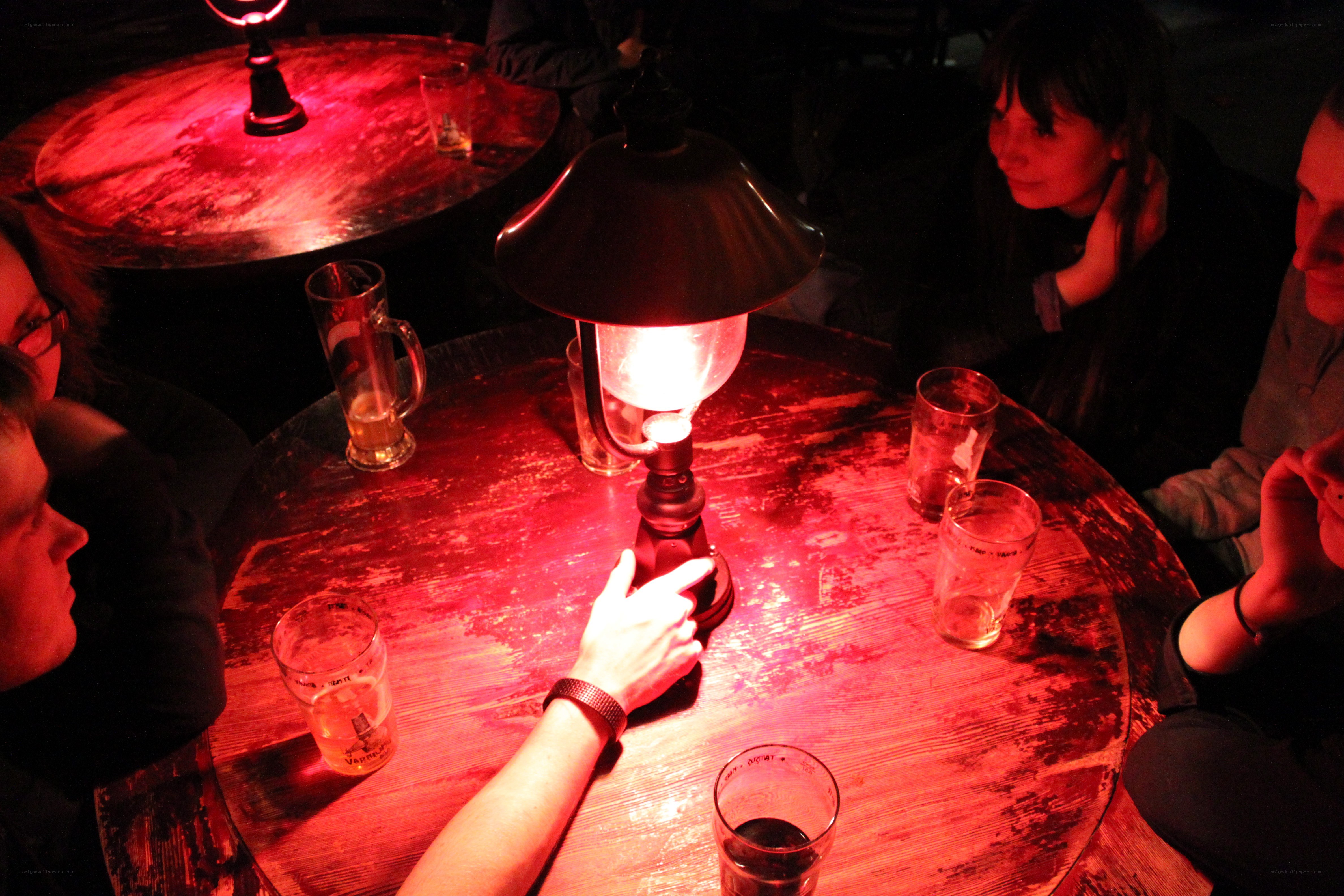 Friends at a dimly lit bar